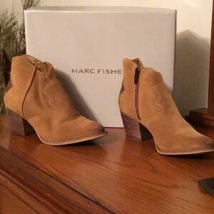 Size 6 women’s boots by Marc Fisher.  Medium brown suede in color by Stefani.